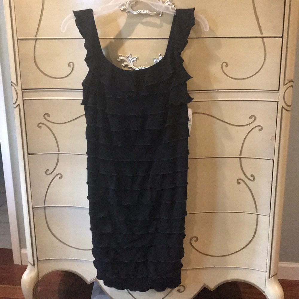 Sleeveless stretchy black knee length dress